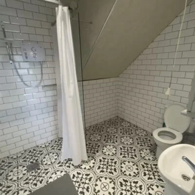 Redory House - Tile ground floor shower room / toilet and sink.
