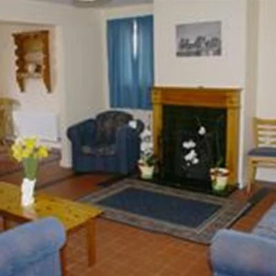 Owenkillew Gortin Accommodation Suite And Activity Centre - living area with fire place