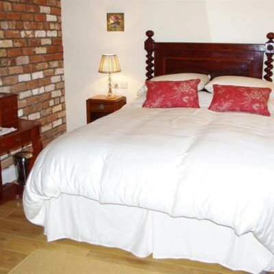 Kilcootry Barn - double bed with side tables