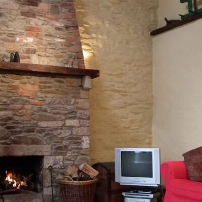 The Bothy - sitting area with open fire
